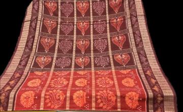 Beautiful traditional motifs inside boxes body with fish buta n Ikat border cotton bandha  sari