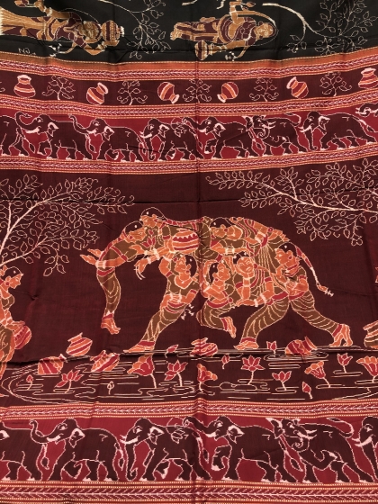 Master weaver s creation Intricately woven Women and elephant motifs Cotton Ikat Saree with Blouse