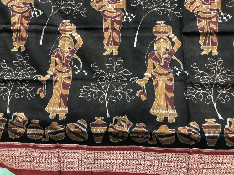 Master weaver s creation Intricately woven Women and elephant motifs Cotton Ikat Saree with Blouse