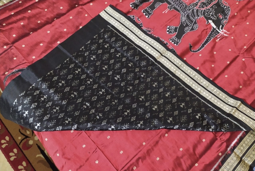 Exclusively Woven Elephant Motifs Om Border and Aanchal with all over Blouse work Ikat Silk Saree