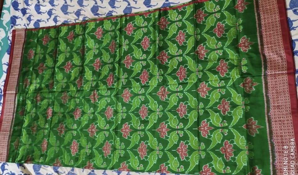 Exclusively woven Parrot and Lotus Motifs Double Ikat Silk Saree with blouse Piece