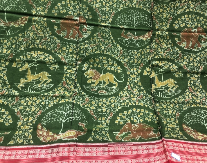 Green and Red intricately woven Jungle theme Cotton Ikat Saree with Blouse Piece