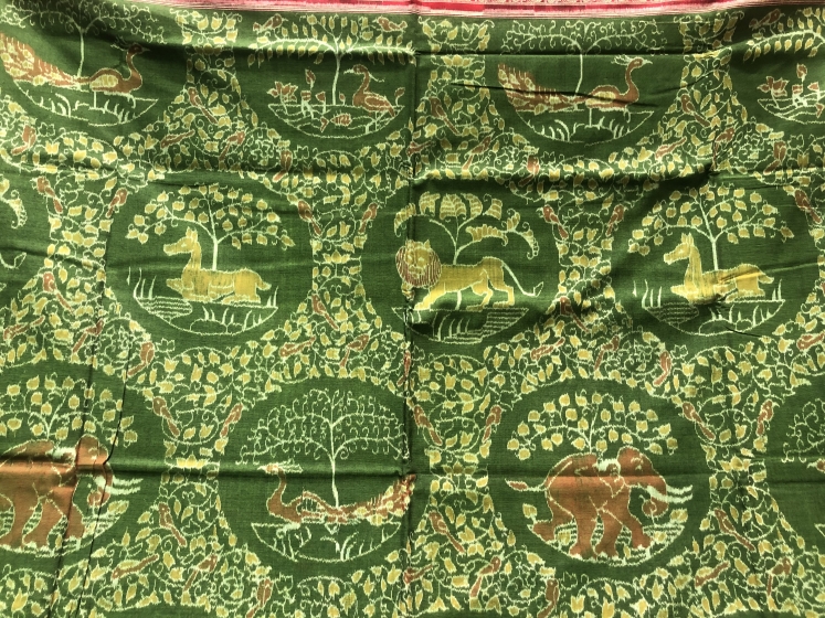 Green and Red intricately woven Jungle theme Cotton Ikat Saree with Blouse Piece