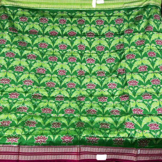 Vibrant n timeless Ikat weave silk saree with Parrot lotus motifs n Ganga Jamuna border with blouse