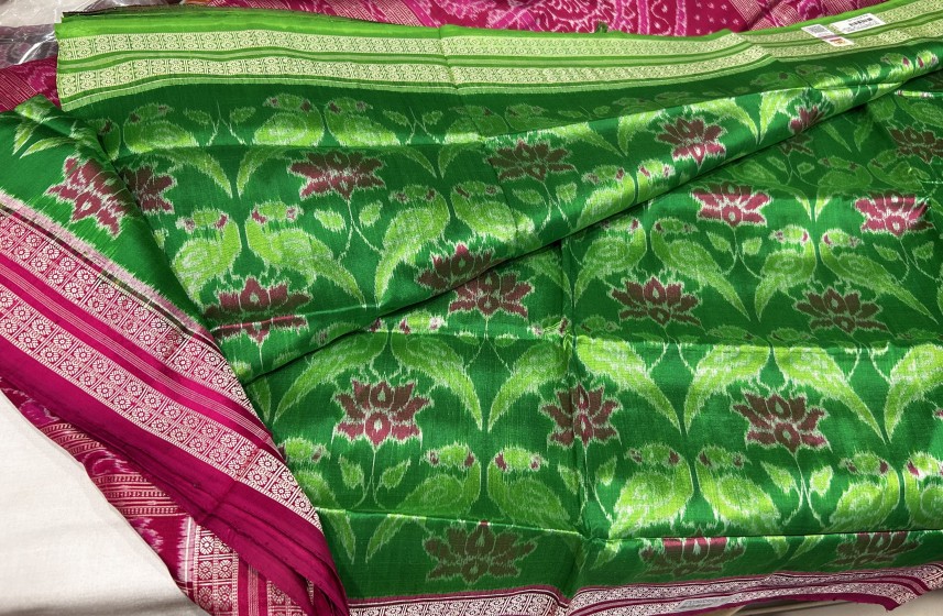 Vibrant n timeless Ikat weave silk saree with Parrot lotus motifs n Ganga Jamuna border with blouse