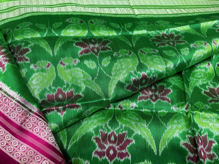 Vibrant n timeless Ikat weave silk saree with Parrot lotus motifs n Ganga Jamuna border with blouse