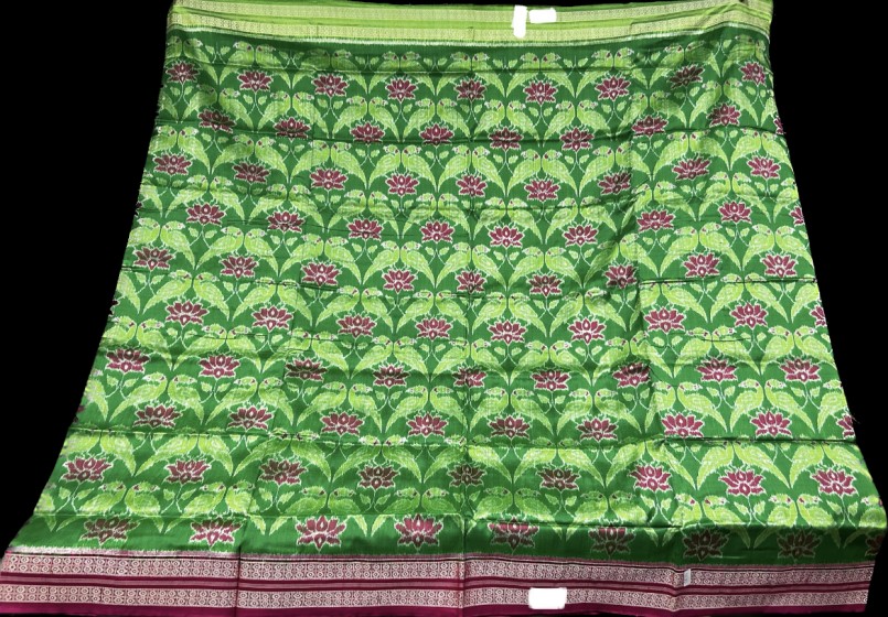 Vibrant n timeless Ikat weave silk saree with Parrot lotus motifs n Ganga Jamuna border with blouse