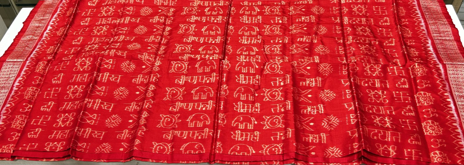 Eternal bliss Laxmi Mantra inspired Ikat weave Silk Saree with Blouse Piece