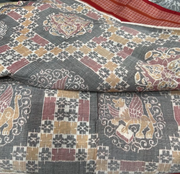 Intricately woven Cotton Ikat Saree with Blouse piece