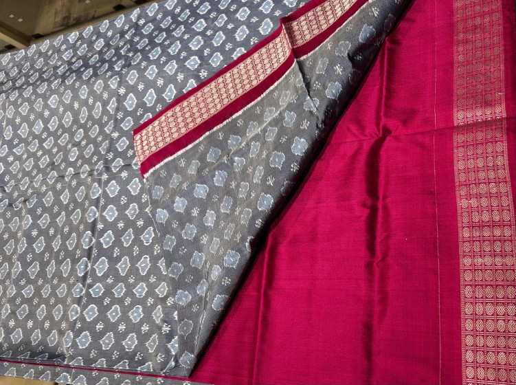 Beautiful simple and elegant Ikat weave silk saree with blouse piece