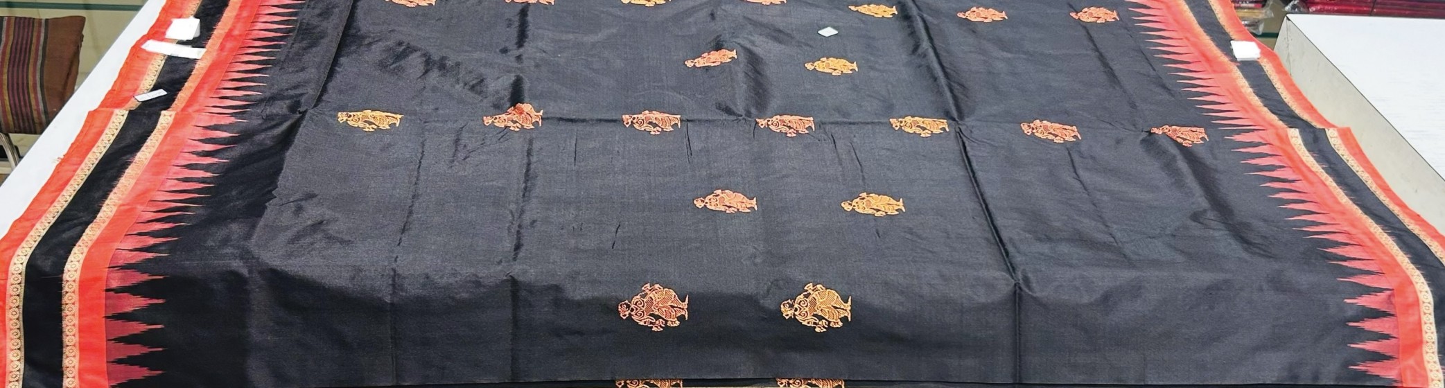 Exclusively woven Pattachitra figure motifs Bomkai Silk saree with blouse piece