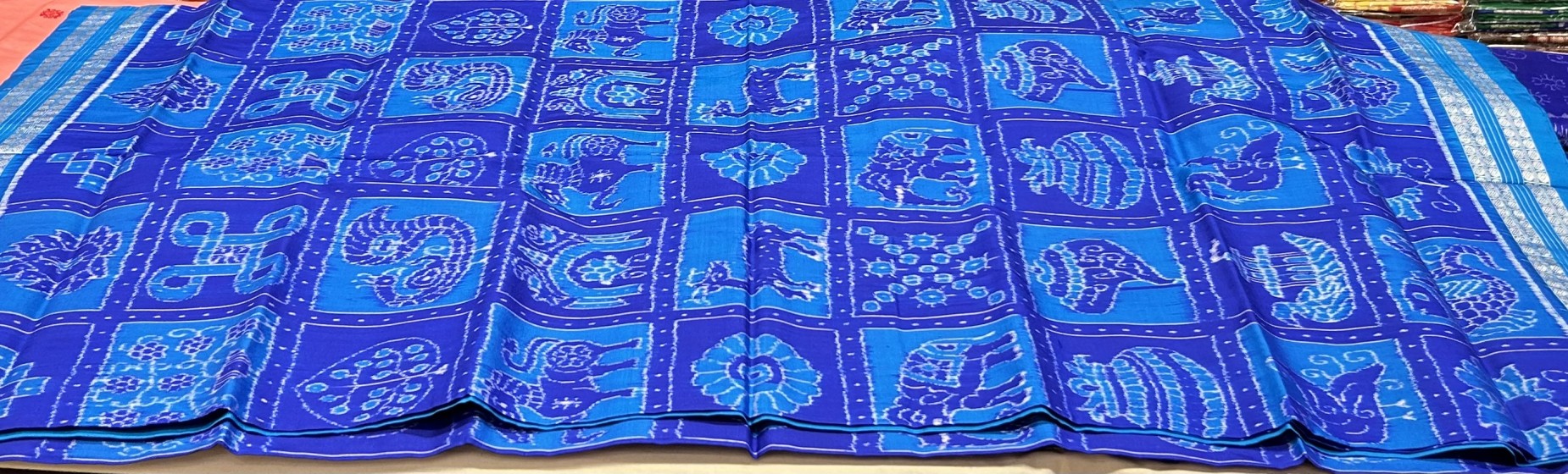 Intricately woven tribal Aanchal Sambalpuri Nabakothi Ikat silk saree with blouse piece