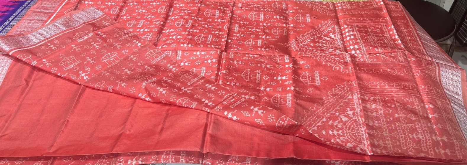 Exquisite intricately woven tribal motifs peach color Ikat weave Silk saree with blouse piece