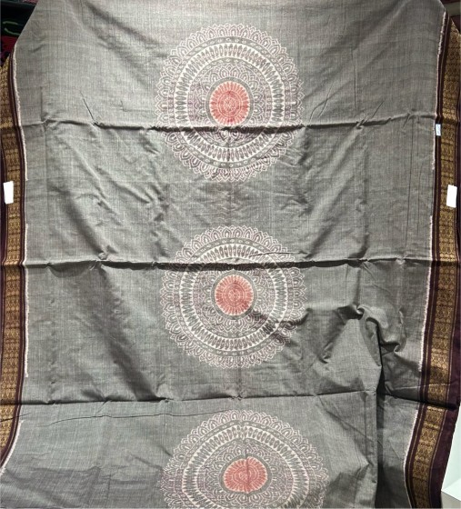 Centrally placed jhoti motifs on the body with elephant and lotus motifs Aanchal cotton Ikat saree