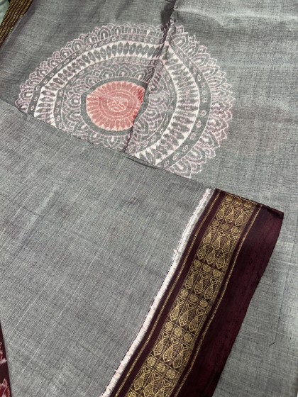 Centrally placed jhoti motifs on the body with elephant and lotus motifs Aanchal cotton Ikat saree