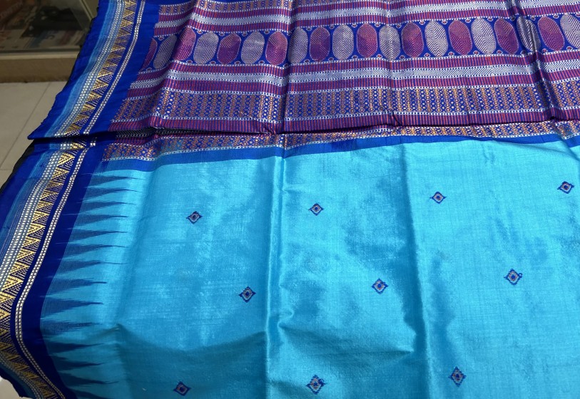 Exquisite blue color Dongria silk saree with blouse piece