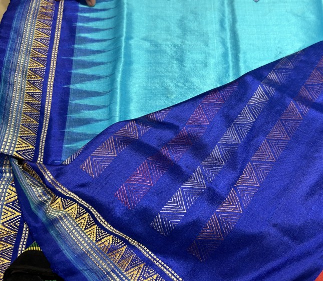 Exquisite blue color Dongria silk saree with blouse piece