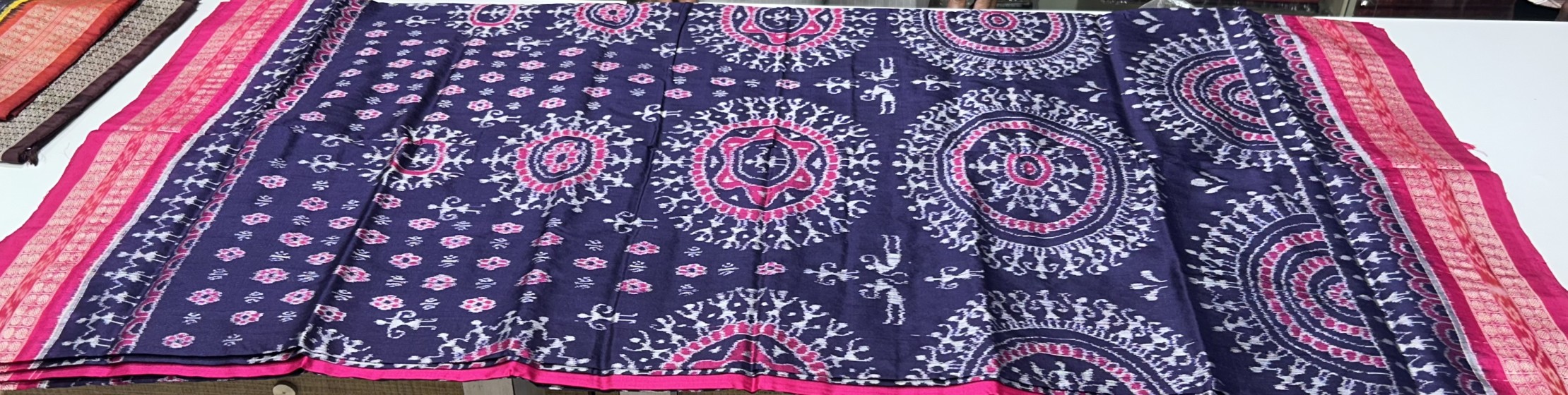 Beautiful traditional Aanchal with tribal motifs body Ikat weave Silk Saree with blouse piece