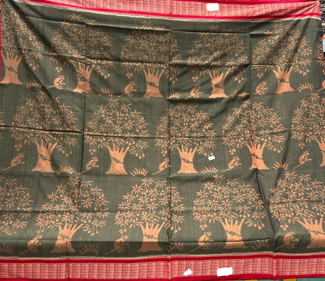 Intricately woven beautiful trees and animal motifs cotton Ikat saree with blouse piece