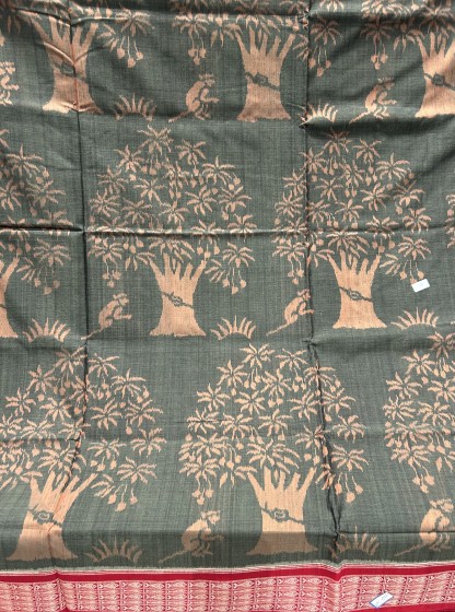 Intricately woven beautiful trees and animal motifs cotton Ikat saree with blouse piece