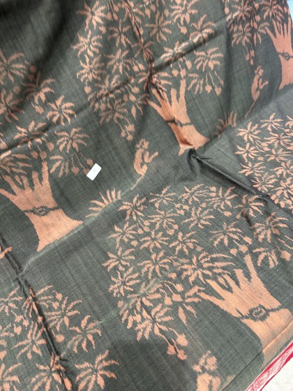 Intricately woven beautiful trees and animal motifs cotton Ikat saree with blouse piece