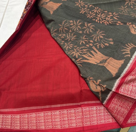 Intricately woven beautiful trees and animal motifs cotton Ikat saree with blouse piece